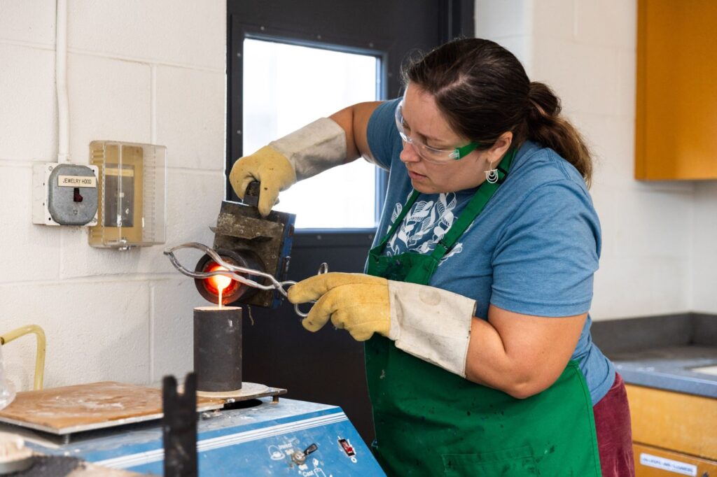 woman working with liquid metal