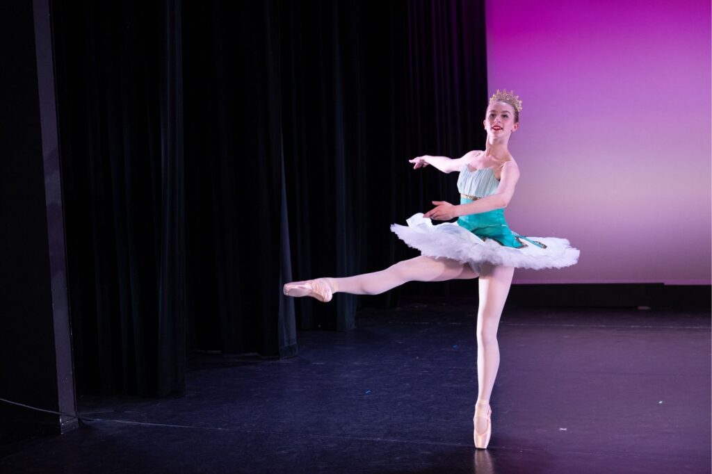 ballet dancer on stage in tutu