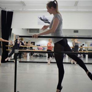 woman teaching ballet class