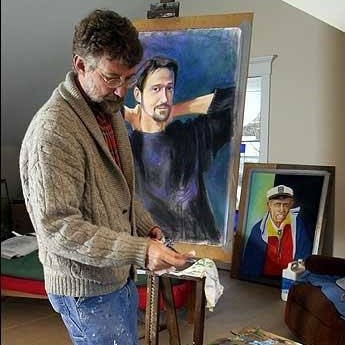 man painting a man