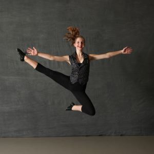 girl leaping for a picture