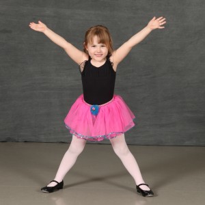 little girl posing in tutu for picture