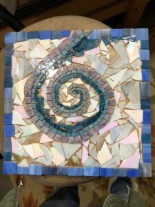 an artwork made from fragments of colored glass