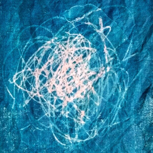 blue and white cyanotype print of dried grass
