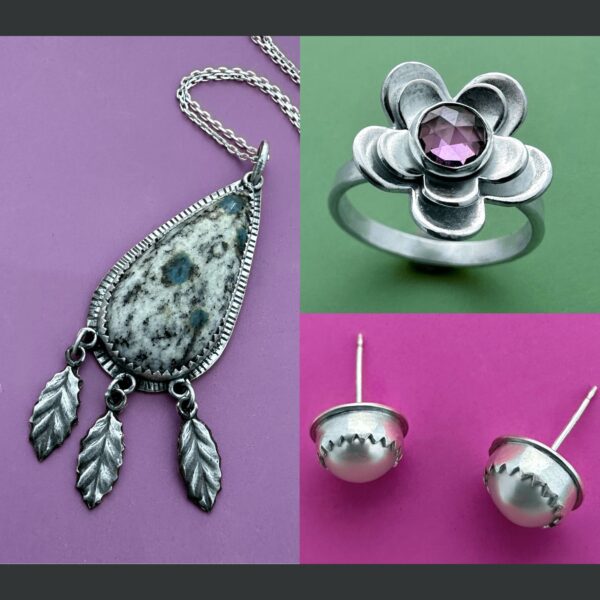 stones set in a pendant, a flower ring, and earrings