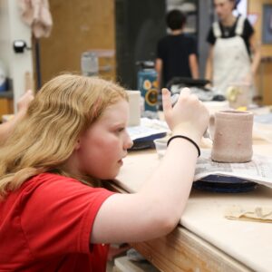 teen making a mug