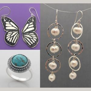 Buttefly earrings, pearl earrings, and a jade ring